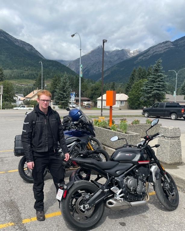 Gavin in the mountains with his motorcycle